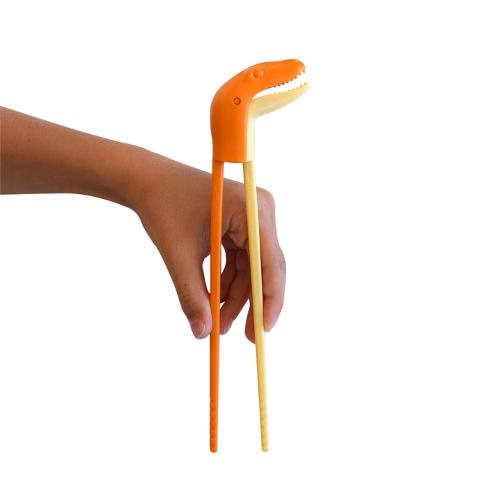 Paličky na jedenie s dinosaurom INVOTIS Raptor Chopsticks, oranžové
